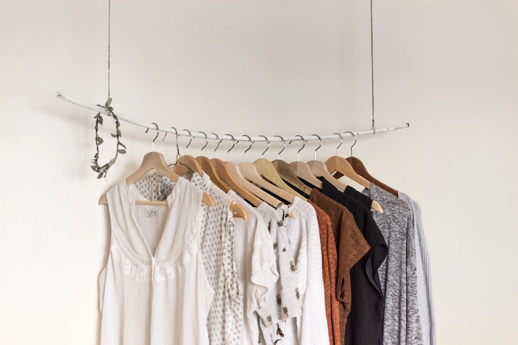 Image of simplistic rack of unique boutique clothing from CREAM Life + Style in Fernwood Victoria BC