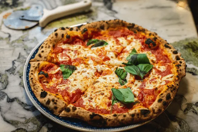 Image of Fresh margarita pizza from Fernwood Pizza Company in Fernwood Victoria BC